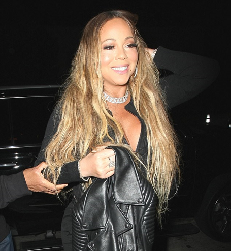 Mariah holds hands with on-off beau Bryan Tanaka | mcarchives.com