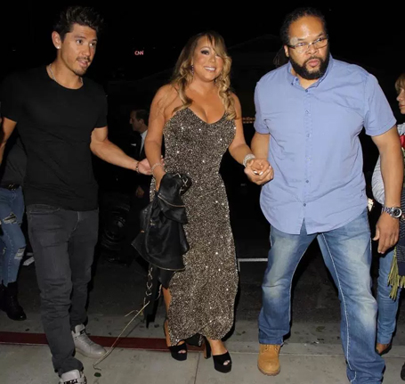 Mariah Carey on a night out with boyfriend Brian Tanaka | mcarchives.com