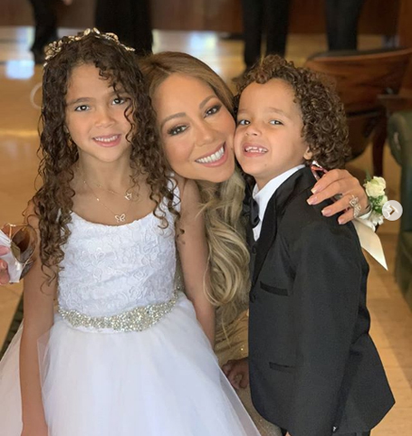 Mariah at her nephew's wedding | mcarchives.com