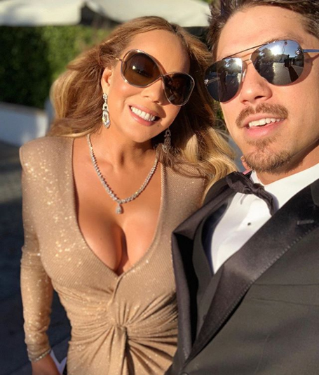 Mariah at her nephew's wedding | mcarchives.com
