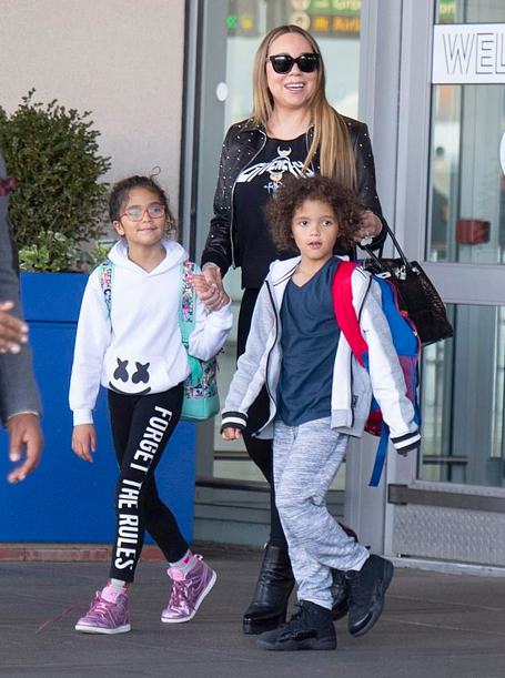 Mariah Carey touches down in New York | mcarchives.com