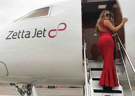 Mariah shows off her incredible figure in tight red dress | mcarchives.com