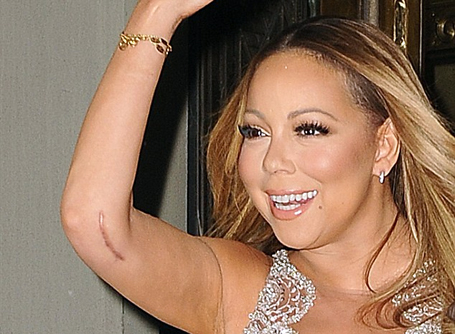 Busty Mariah Carey reveals large scar | mcarchives.com